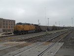 UP 7167  1Apr2011  EB Riding the back of a train of empties 